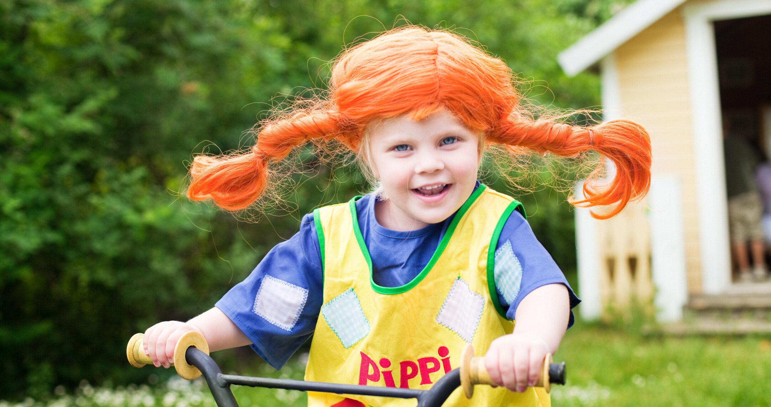 A child dressed as Pippi Longstocking.