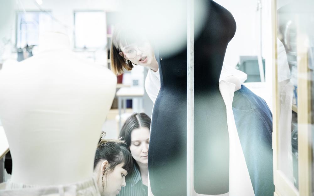 Students designing clothing.