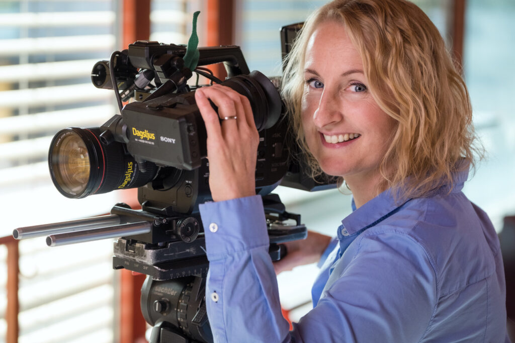 A female director with her camera.