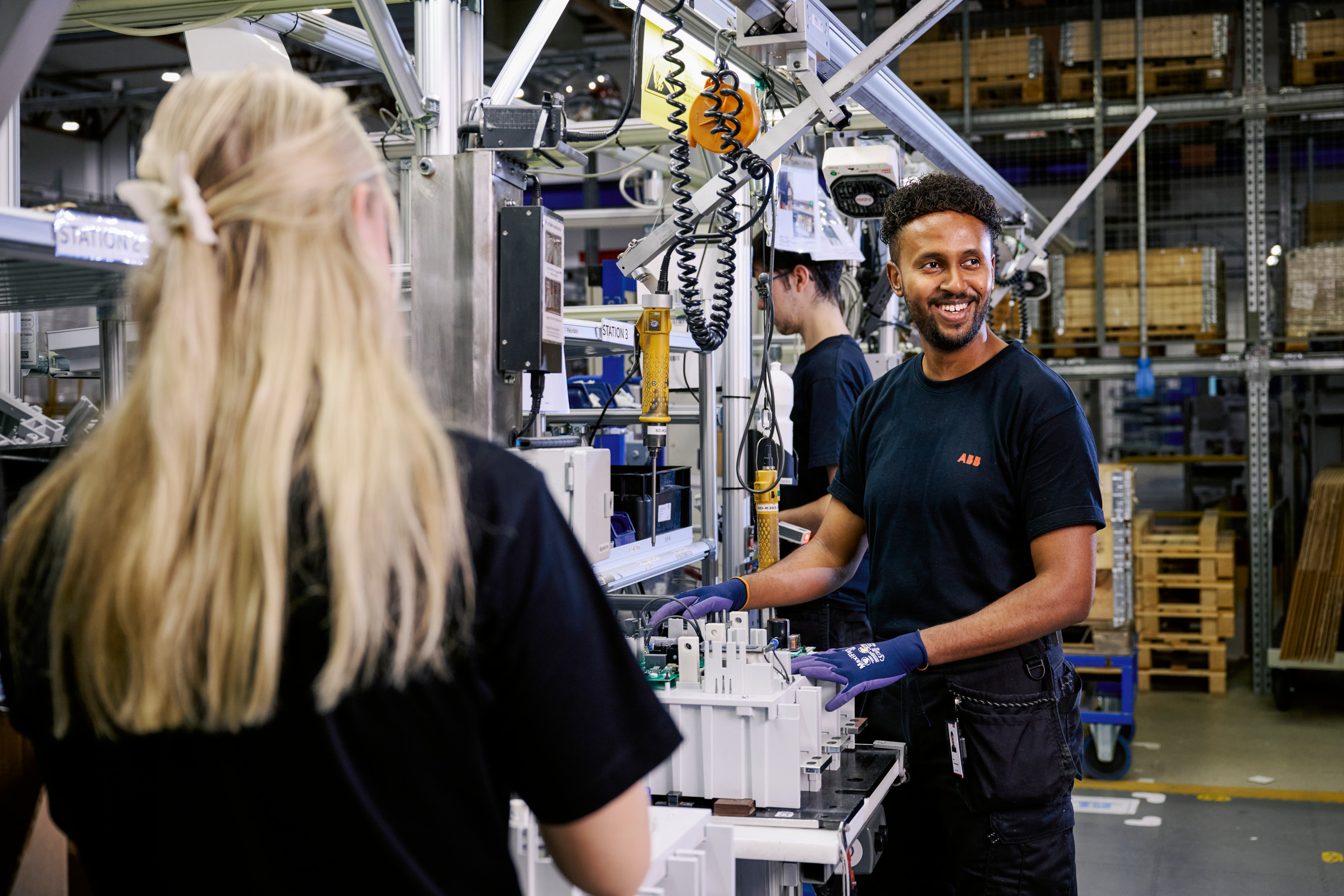 People at work in an industry.